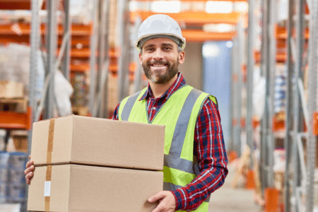 warehouse man holding boxes